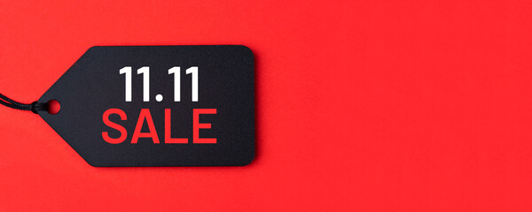 11.11 single day sale concept. Black tag on red background