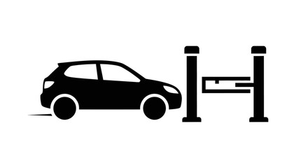 A black car approaching a vehicle lift, ready for servicing or repair.