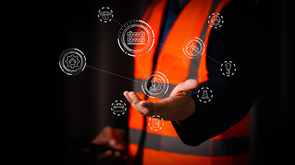 Worker in safety vest presenting digital contract management and factory industry icons, symbolizing teamwork, business agreement, automation, and smart industrial technology solutions.