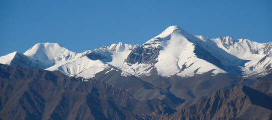 Snow covered peaks of the Zanskar Range, view from Leh, India.
