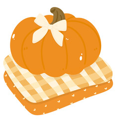 Cute pumpkin on blankets, cozy autumn decoration 
