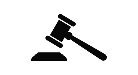 A black gavel resting on a sound block a striking silhouette