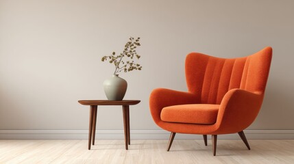 A stylish orange chair stands next to a wooden table displaying a simple vase with dried flowers. The minimalist design highlights the warm tones and calm atmosphere of the room