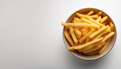 a bowl of crispy french fries with a white background for copy space image