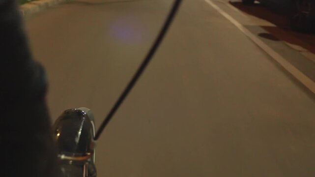 Close-up of a kickboard in motion, night in Vienna