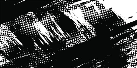 Abstract halftone background featuring a mix of black and white halftone dots and brush strokes paintbrush grunge with halftone dots pattern texture.