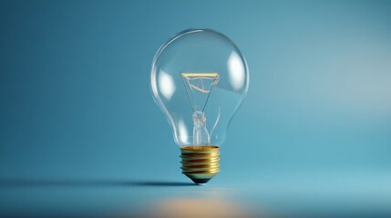 A modern LED light bulb emits a warm glow against a cool blue background, symbolizing innovation, creativity,