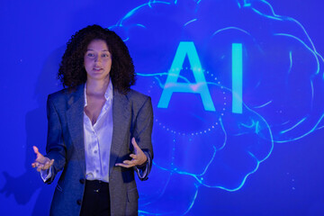 Speaker presents artificial intelligence AI concepts at a technology conference