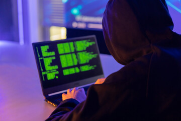 hacker  try to break through the security  with coding on the screen