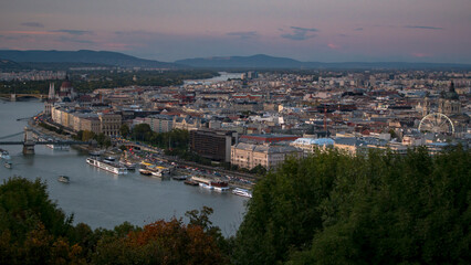 Obraz premium Tram and cruise ships near the Hungarian Parliament in Budapest