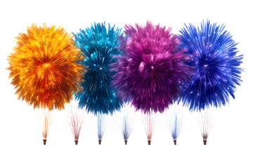 Four brightly colored fireworks burst in vivid orange teal magenta and blue hues Sparkling ground fountains below