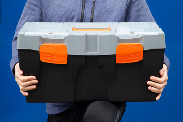 The toolbox is in the master's hands.