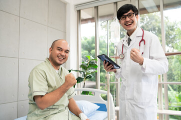 The doctor talks and encourages the patient about treatment options using a digital tablet, promoting clear communication and trust in a bright and supportive hospital environment.