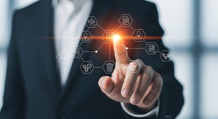 Business professional interacting with futuristic digital interface and financial data visualization