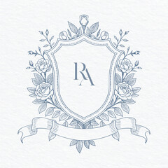 Vintage floral shield wedding crest with ornate banner. Elegant botanical monogram emblem decorated with roses.
