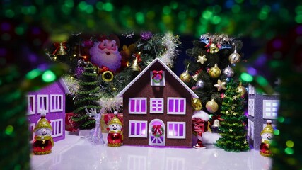 A cute Christmas town in the middle of a decorated wreath