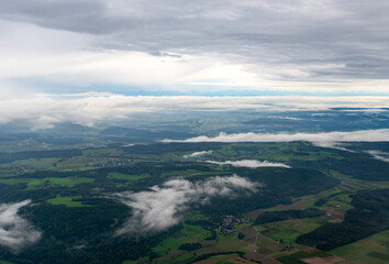 An aerial view of low cloud over the rural landscape near Zurich, Switzerland