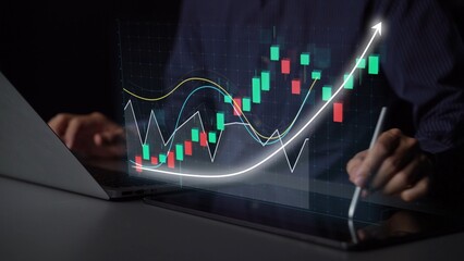 A focused individual analyzes financial data through digital charts on a laptop, capturing market trends with visually appealing graphs and insightful analytics. Copula