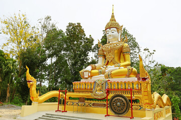 Stunning Southern Thai Buddha Image of Wat Khao Phang Buddist Temple, near Chiao Lan dam in Surat Thani, Thailand