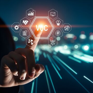 Hand touching holographic network of technology and business icons with vuc in center