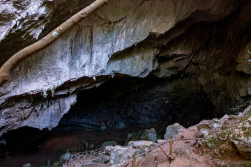 Nimara cave near Marmaris, Turkey inside. Stalactites stalagmites and streak formations in cave of Nimara Magarasi, Turkey. Stone walls and rocks in natural cave. stones covered with moss