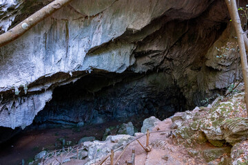 Nimara cave near Marmaris, Turkey inside. Stalactites stalagmites and streak formations in cave of Nimara Magarasi, Turkey. Stone walls and rocks in natural cave. stones covered with moss