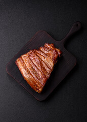 Grilled or barbecued pork or beef ribs with sauce. Cooked or smoked ribs