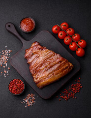 Grilled or barbecued pork or beef ribs with sauce. Cooked or smoked ribs