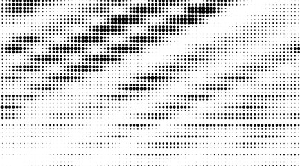 Dynamic black and white halftone pattern features varying sizes of dots creating an abstract wave-like design with strong contrast and graphic visual appeal, ideal for backgrounds