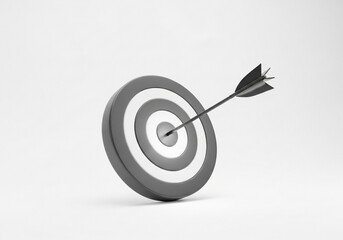 Arrow hitting the bullseye on a target isolated on white background
