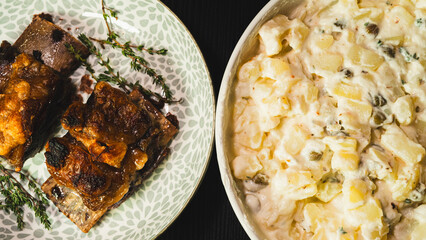 Tender, fall-off-the-bone beef short ribs served with a classic Brazilian potato mayonnaise salad....