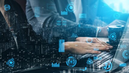 A modern business setting showcasing hands typing on a laptop with digital overlays of data analysis and cityscape, symbolizing innovation and technology. Xenic