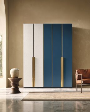 A modern wardrobe with a contemporary design, featuring contrasting white and navy blue panels, accentuated by brass handles, sits in a sophisticated, neutral-toned room.