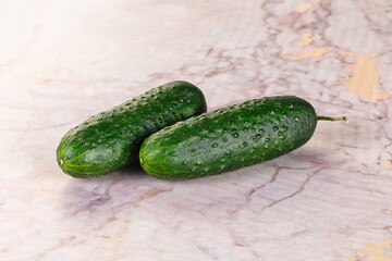 Ripe green raw two cucumbers