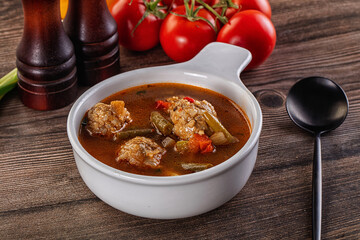 Tomato Soup with meatballs and vegetables