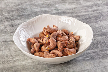 Unpeeled cashew nuts in the bowl