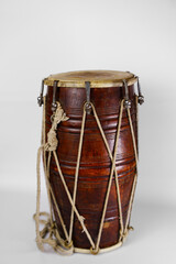 Traditional wooden drum with natural finish and rope bindings, perfect for music and dance celebrations