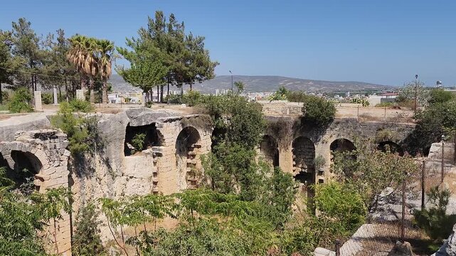 Tekir Ambari, a large Byzantine cistern at the foot of Silifke Castle, measures 46x23x14 meters and has walls supported by smooth ashlar stones