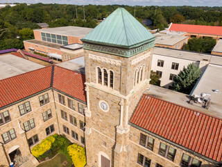 Daytime Drone Images of a High School Built in the 1920's With A Tile Roof and Masonary Walls