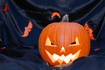 Spooky Halloween jack-o'-lantern with bats
