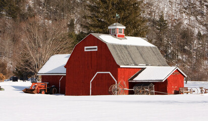 Red barn on a snowy field in Charlemont, Massachusetts