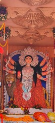 Idol of Goddess Devi Durga at a decorated puja pandal , Durga Puja is a famous and major religious traditional festival of Hinduism that is celebrated throughout the world.

