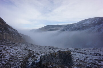 Snowy Mountains of Azerbaijan with Morning Fog