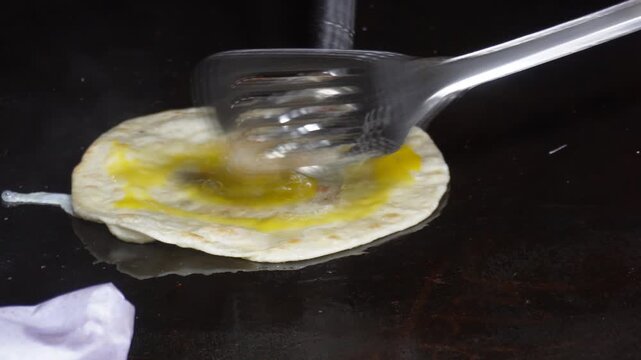 preparation of an egg roll a popular street food