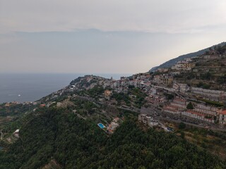 Fototapeta premium Aerial view of Amalfi Coast houses on terraced cliffs