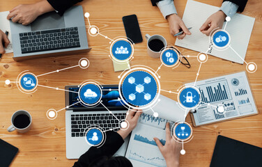 Engaging visual of a collaborative business meeting with technology themes, showcasing data analytics, teamwork, and strategic discussions among professionals in a modern workspace. Amity