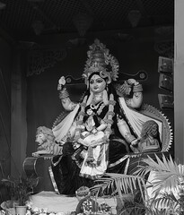 Idol of Goddess Devi Durga at a decorated puja pandal , Durga Puja is a famous and major religious traditional festival of Hinduism that is celebrated throughout the world.

