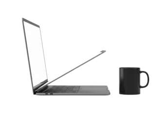 Sleek dark gray modern laptop, lid open to a white screen, angled 45 degrees, with a matte black ceramic coffee mug beside it, on a seamless transparent background. Professional minimalist product