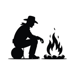 Cowboy silhouette sitting by a campfire under the night sky