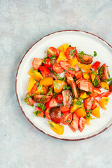 Fresh salad with tomatoes.